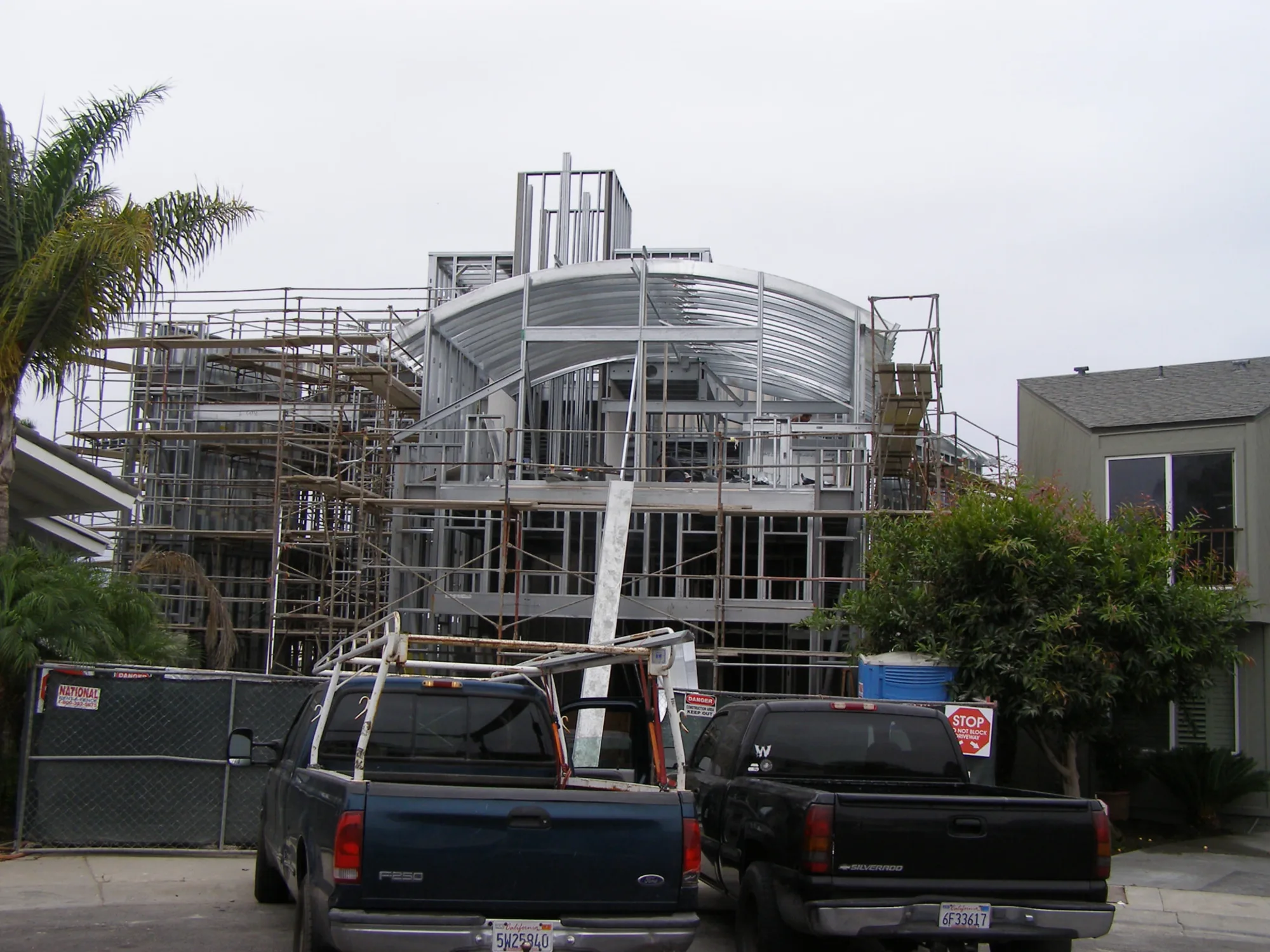 Front view of a residence with arched cold-formed steel roof framing