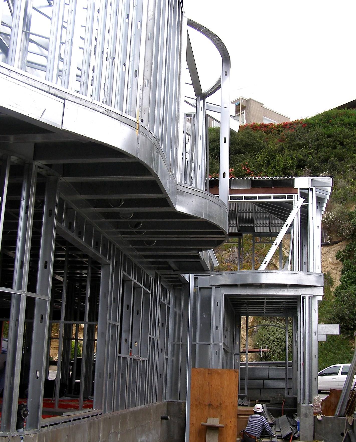 Curved cold-formed steel framing on a custom residential project.