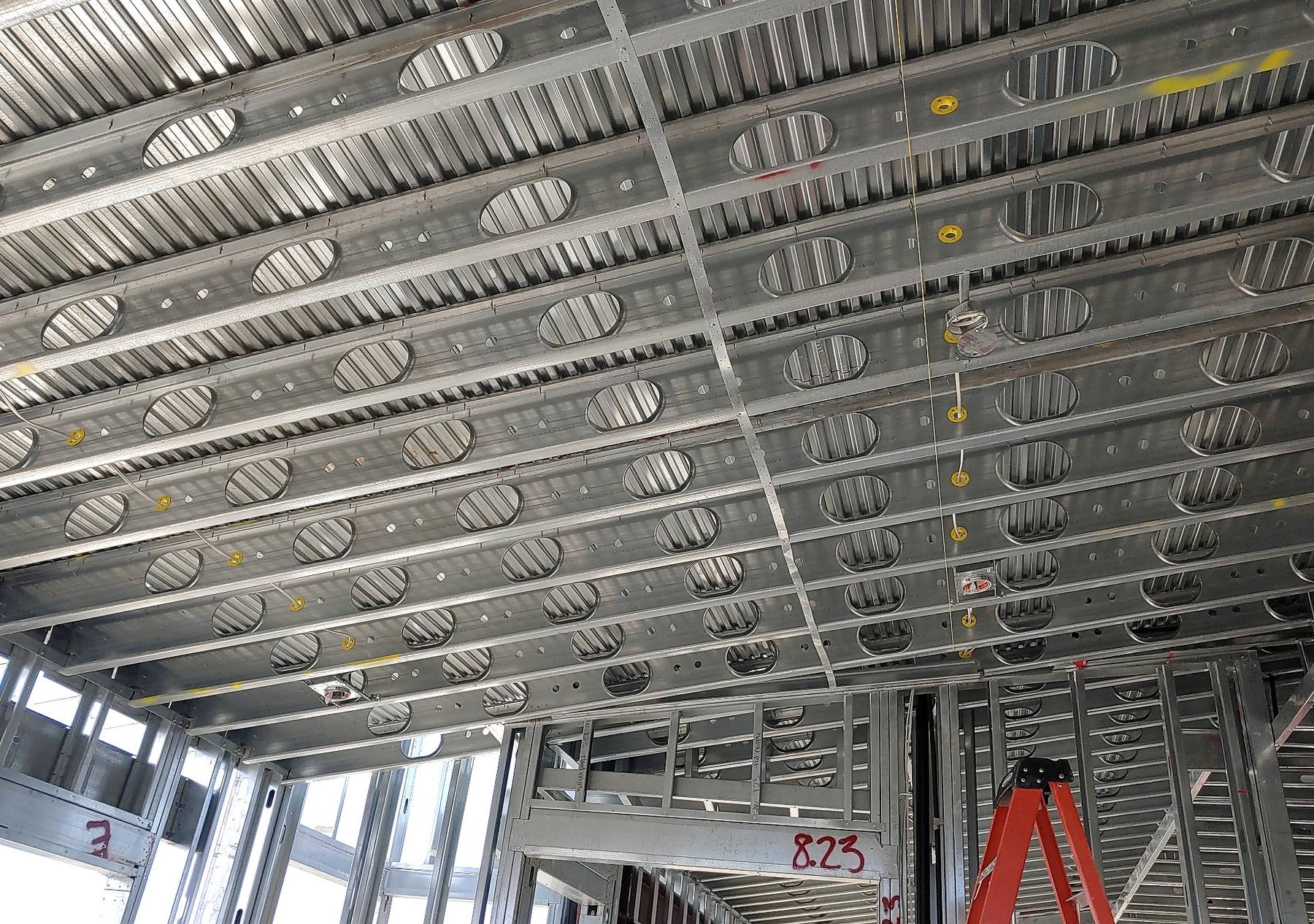 Residential cold-formed steel floor and ceiling joist framing.