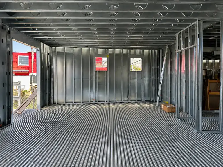 Interior of a residence showing cold-formed steel wall, floor and ceiling framing